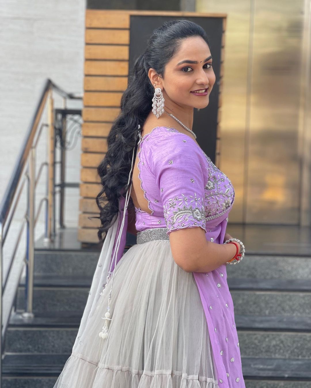 Telugu Tv Anchor Kasi Annapurna Stills in Violet Lehenga Choli